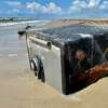 Jace Tunnell, director of the Mission-Aransas National Estuarine Research Reserve, found a locked metal safe wedged in the sand near Port Aransas. 